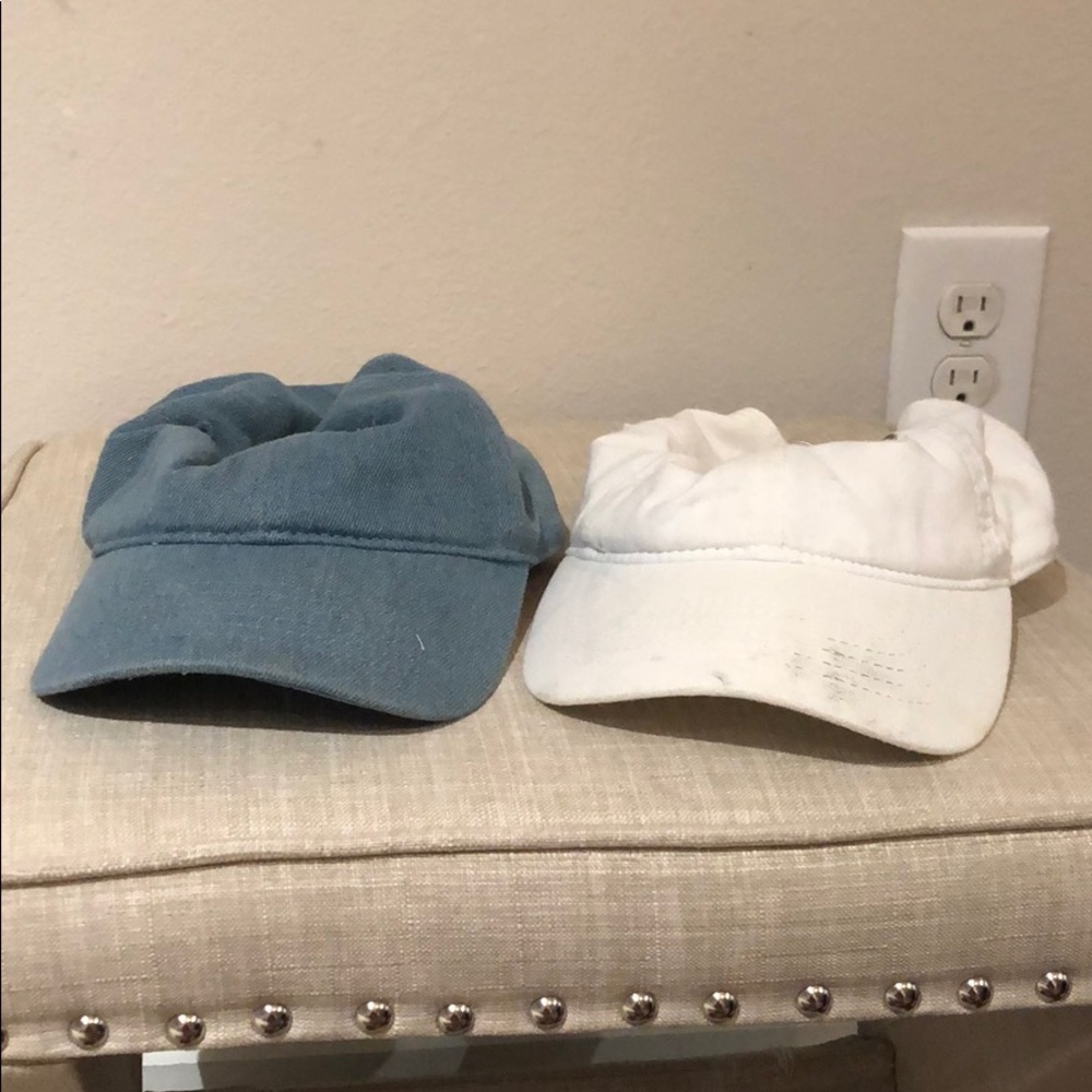 Two baseball caps